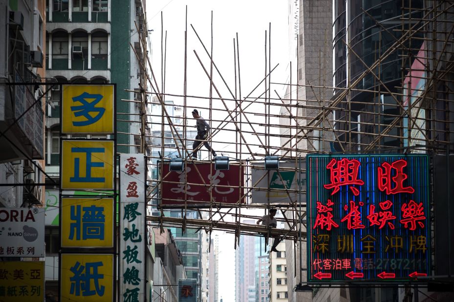 Neon lights and signs hanging over streets are among the hardest places to scaffold, says Ho.