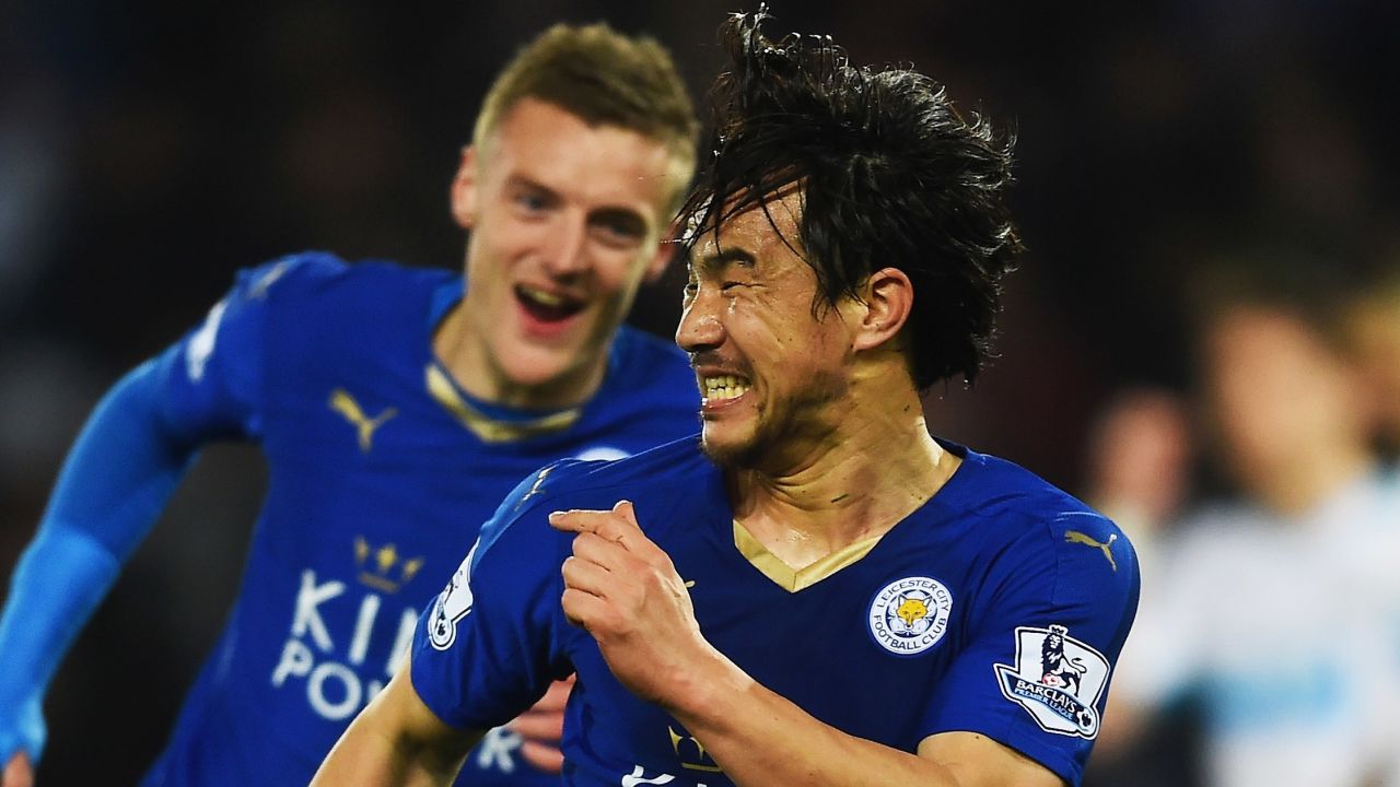Shinji Okazaki and Jamie Vardy celebrate one of Leicester City's 63 league goals this season. 
