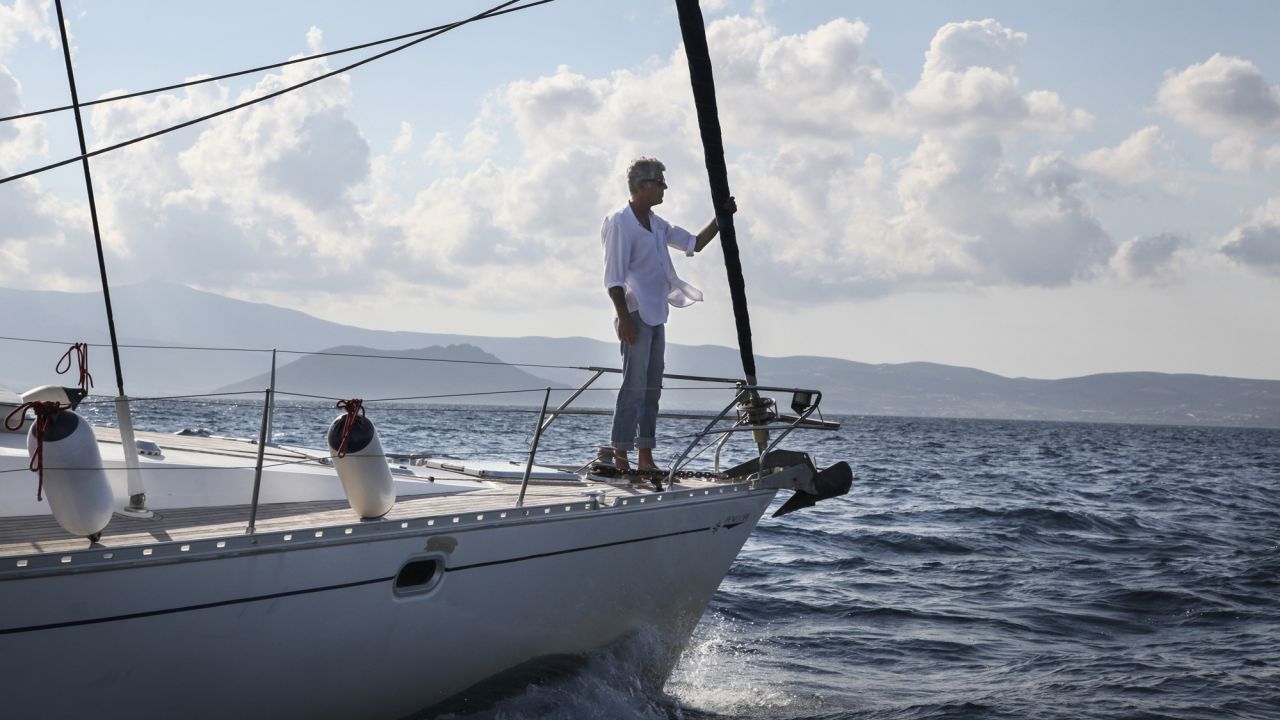 Anthony Bourdain: Parts Unknown - 401 - Greece  Tony stands at the Bow of the Penelope sailboat as we circle around Naxos, Greece.