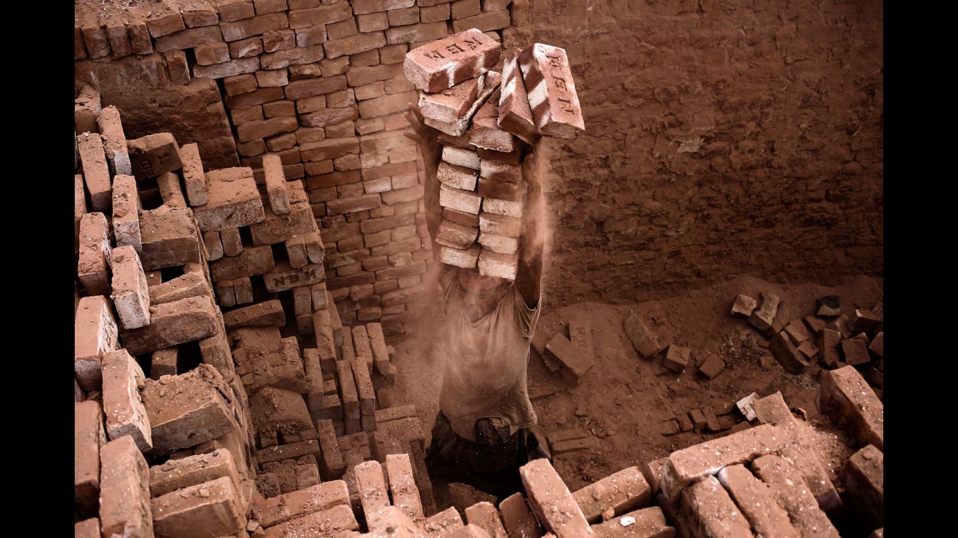 A laborer works in a brickyard in Dhaka, Bangladesh, on Monday, April 25.