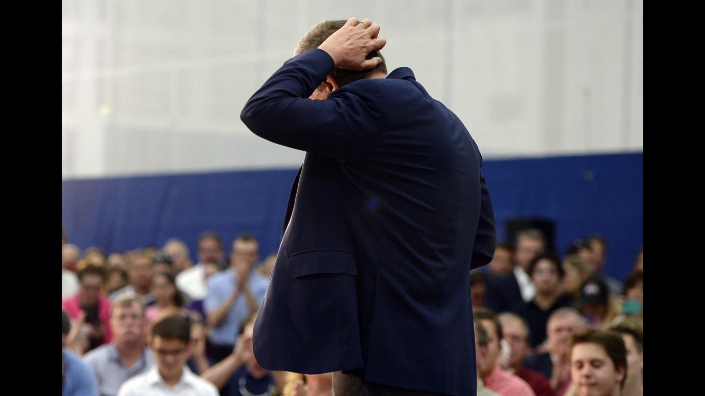 Ohio Gov. John Kasich, a Republican presidential candidate, scratches his head at a campaign event in Glastonbury, Connecticut, on Friday, April 22.