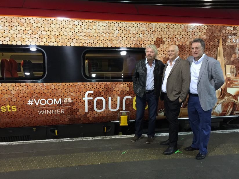 Founders of Fourex Jeff Paterson and Oliver du Toit pose for the cameras with billionaire entrepreneur, Richard Branson. 