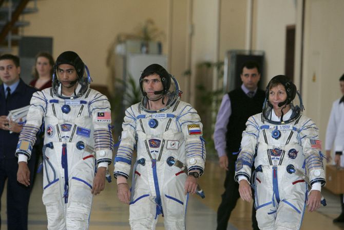 Spending months on end in space meant that many women chose to take contraceptives to put their period on hold. Pictured, Peggy Whitson (right) was the first woman to command the International Space Station, completing a six-month tour of duty in 2008.