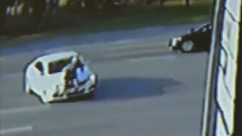 NS Slug: FL: MAN CLINGS TO CAR IN ROAD RAGE INCIDENT Synopsis: An odd road rage incident is caught on camera Keywords: FLORIDA MAN ROAD RAGE CLINGS CAR