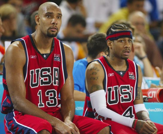 <strong>2004 Olympic basketball:</strong> Tim Duncan and Allen Iverson look bewildered as they watch struggling fellow Team USA members play in Athens. America placed third on the podium and lost three games in that tournament -- the first, a 19-point route to Puerto Rico. 