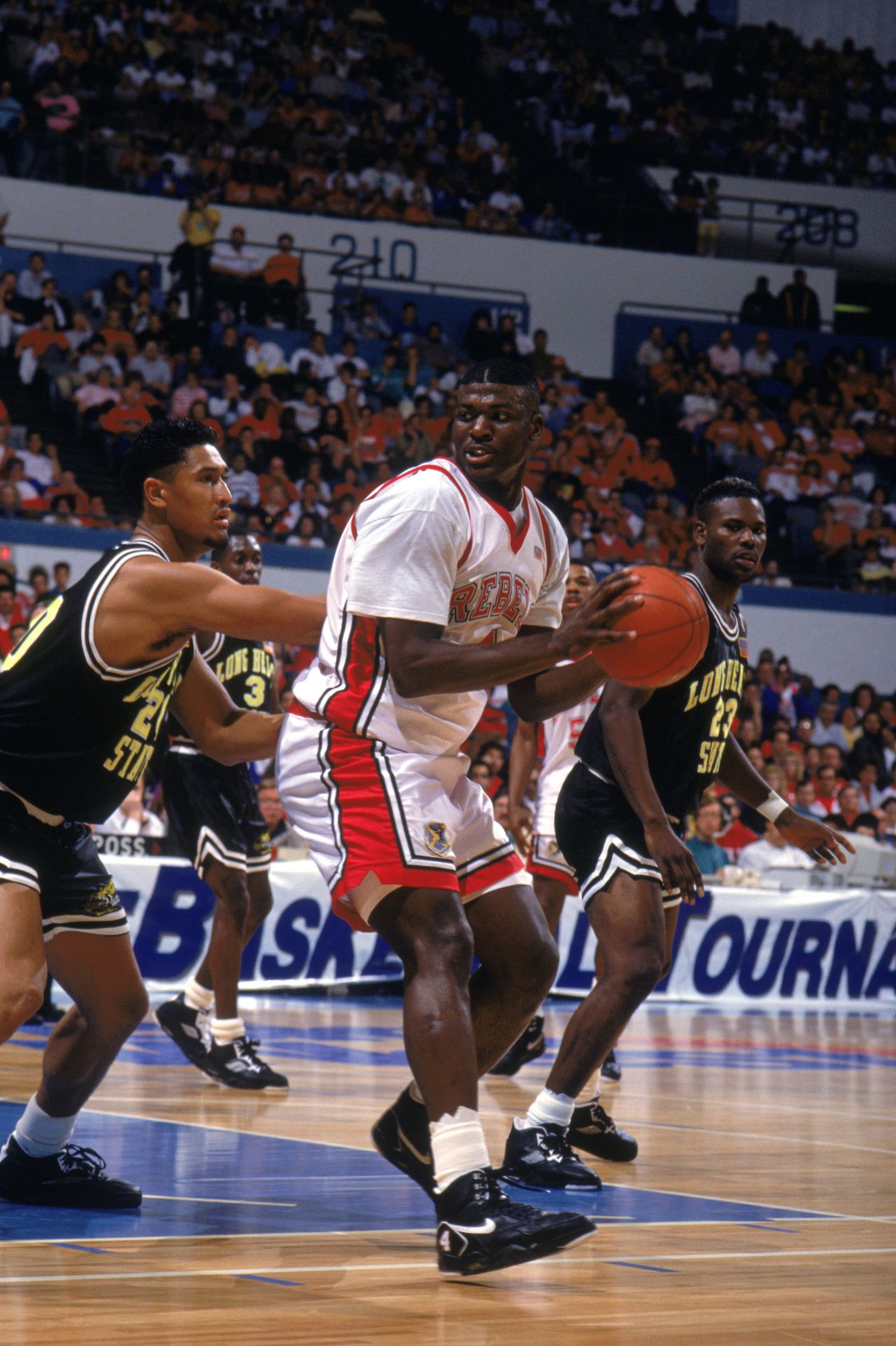 <strong>UNLV Runnin' Rebels</strong> <strong>March Madness 1991: </strong>Larry Johnson would go on to have a distinguished career with the Charlotte Hornets and New York Knicks in the NBA. But winning back-to-back titles with UNLV would have left a mark as one of the greatest college teams to ever grace the game.  