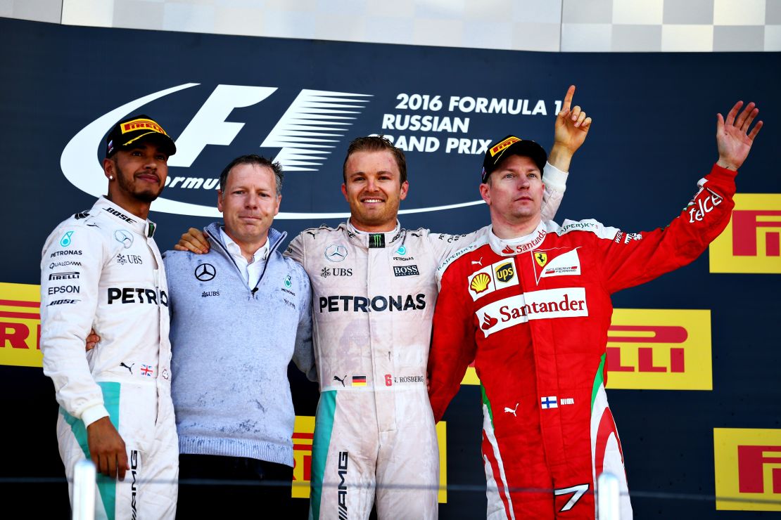 Lewis Hamilton, Nico Rosberg and Kimi Raikkonen celebrate on the podium