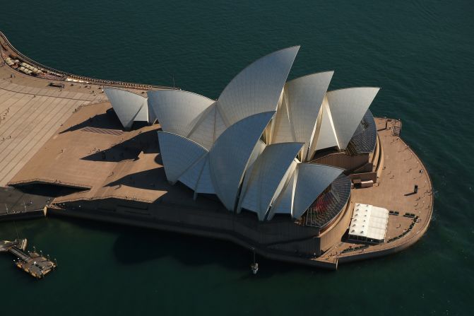 A spectacular view of Sydney's most famous landmark, the Opera House, as it casts its distinctive shadow on a sunny April day. 