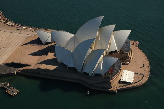 A spectacular view of Sydney's most famous landmark, the Opera House, as it casts its distinctive shadow on a sunny April day.