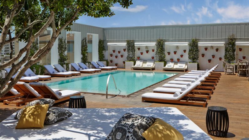 The Mondrian's lofty Outdoor Living Room features a lovely teak deck, mosaic poolside tables, groovy up-tempo house mixes (pumped underwater) and perfect L.A. panoramas. 