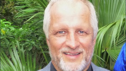 Harold Nichols and his wife had planned to return to the U.S. in August.