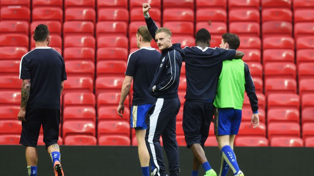 Jamie Vardy, Leicester City's star striker, acknowledges the fans in Manchester. Vardy was recently named player of the year by the English Football Writers' Association. He has 22 Premier League goals this season.