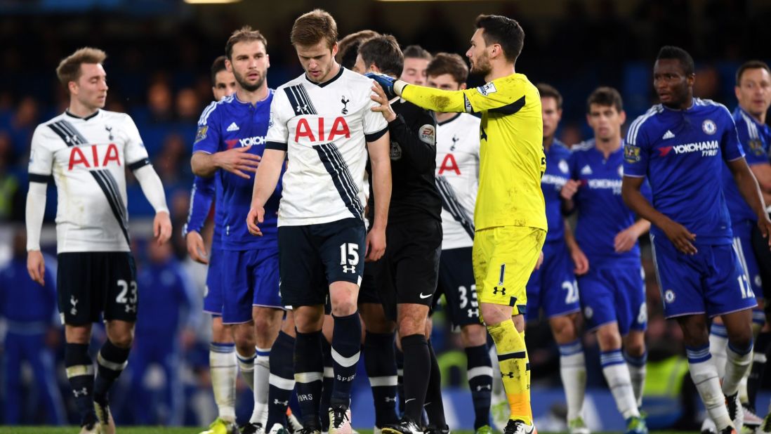 Chelsea and Tottenham players scuffle after Tottenham's Eric Dier, front, brought down Hazard.