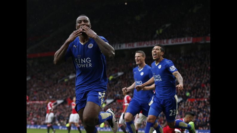 Leicester City's Wes Morgan blows a kiss after scoring a goal at Manchester United on Sunday, May 1. The match ended 1-1, delaying Leicester's hopes of winning the English Premier League title. But when second-place Tottenham tied Chelsea the next day, the club was finally crowned <a href="index.php?page=&url=http%3A%2F%2Fwww.cnn.com%2F2016%2F05%2F02%2Ffootball%2Fgallery%2Fleicester-city-wins-title%2Findex.html" target="_blank">the unlikeliest champion in history.</a> The Foxes started the season as a 5,000-to-1 long shot.