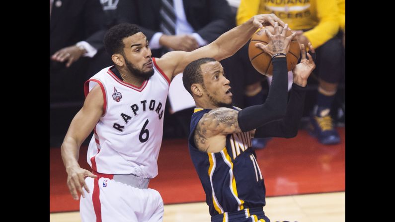 Toronto's Cory Joseph rejects Indiana's Monta Ellis during Game 7 of their NBA playoff series on Sunday, May 1. Toronto won 89-84 to advance to the second round.