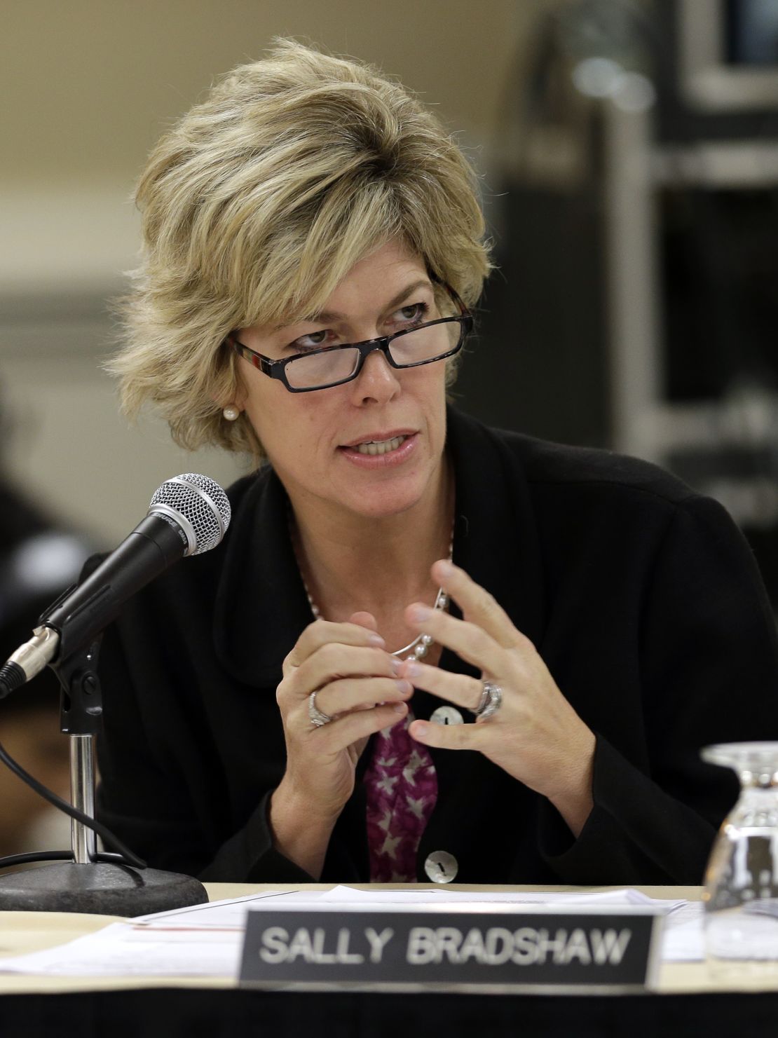 Florida State Board of Education member Sally Bradshaw gestures as she interviews finalists for the commissioner of education on December 11, 2012, in Tampa, Florida.