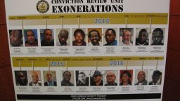 A posterboard in the Brooklyn District Attorney's office shows the faces of the 20 men and women who have been exonerated under Thompson's watch