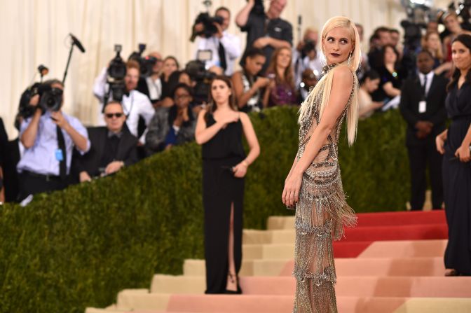 Poppy Delevingne is pictured wearing Marchesa. 