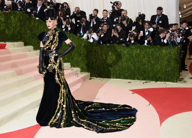 Singer Katy Perry is pictured wearing a heavily embellished Prada gown.  