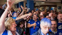 LEICESTER, ENGLAND - MAY 01:  Fans celebrate in The Market Tavern after Leicester City score a goal against Manchester United on May 1st, 2016 in Leicester, England. Leicester City can win the Premier League title today if they beat Manchester United away at Old Trafford in what would be one of the league's most surprising and memoriable moments.  (Photo by Rob Stothard/Getty Images)