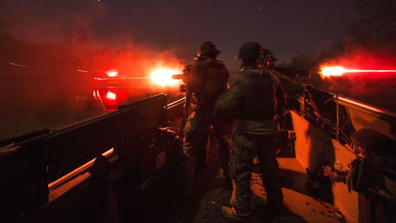 Sailors fire weapons during a training exercise near Fort Knox, Kentucky, on Sunday, April 17.
