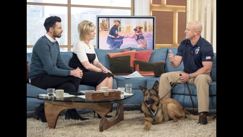 Marine Gunnery Sgt. Chris Willingham, right, appears on a morning show in London with Lucca, a retired military dog <a href="http://www.cnn.com/2016/04/05/us/lucca-marine-dog-medal-honor-irpt/" target="_blank">who lost her leg</a> when an IED detonated underneath her in 2012. Lucca successfully completed 400 missions and protected the lives of thousands of troops during her six years of service, according to a statement from The People's Dispensary for Sick Animals, a British organization known as PDSA. She was given the PDSA Dickin Medal, the highest honor animals can receive for their military service.