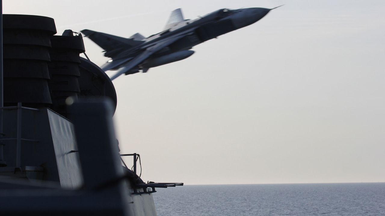An unarmed Russian fighter jet flies close to the USS Donald Cook, which was sailing in the Baltic Sea. It was one of <a href="http://www.cnn.com/2016/04/13/politics/russian-fighter-jet-us-destroyer/index.html" target="_blank">two close encounters</a> in early April, and the U.S. Embassy in Moscow communicated formal concerns to the Russian government about the incidents, according to White House Press Secretary Josh Earnest.