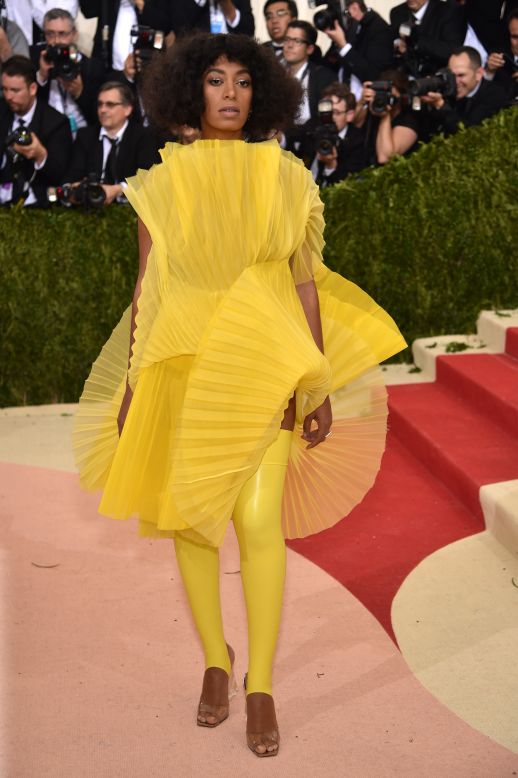 Solange Knowles wears a lemon yellow ensemble by David LaPort. 