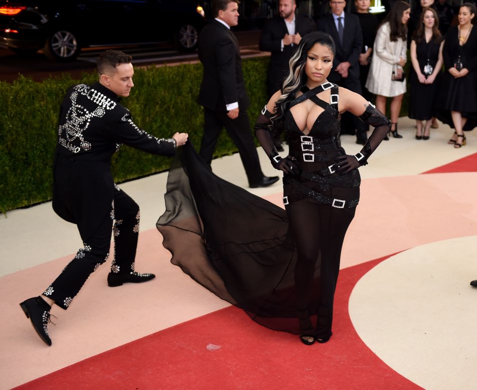 Singer Nicki Minaj is pictured above with Jeremy Scott, who designed her red carpet gown. 