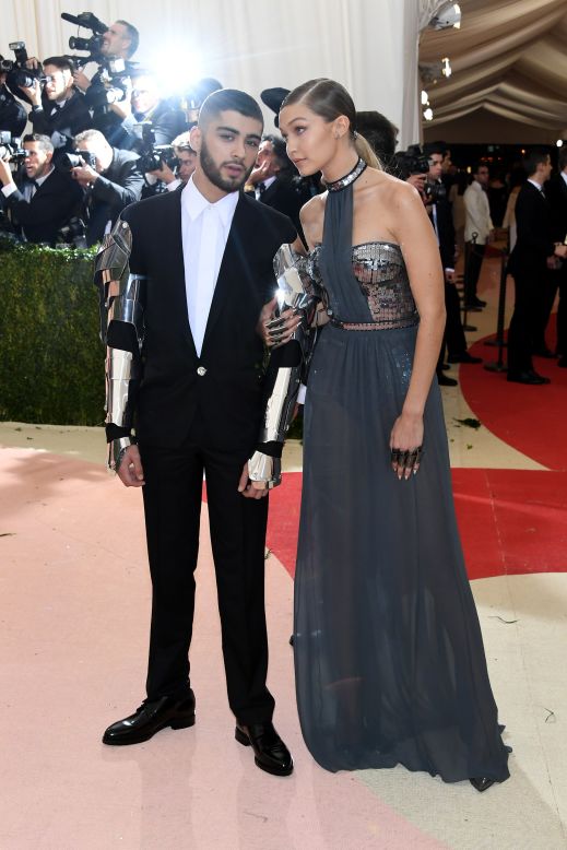 Model Gigi Hadid is pictured alongside singer Zayn Malik, and wears Tommy Hilfiger. 