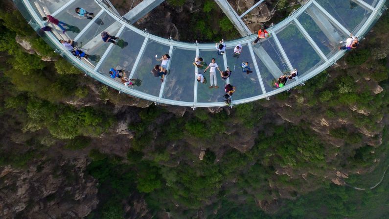 A 33-meter-long glass viewing platform opened in Beijing's Shilinxia Scenic Area on April 30. It overlooks a 1,300-foot-deep valley. 