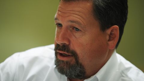 Mark Salter speaks to the travelling press after McCain announced he was suspending his campaign September 24, 2008 at a hotel in New York City.
