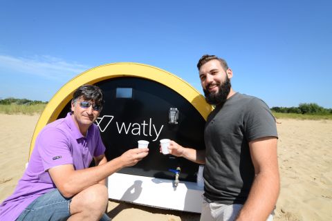 The energy generated through the solar panels is used to produce clean water using a graphene-based filtering process. The company has been testing the technology in rural Ghana and the nest step is to roll out units across Africa. Pictured here are Watly's Matteo Squizzato and Stefano Buiani testing the water.