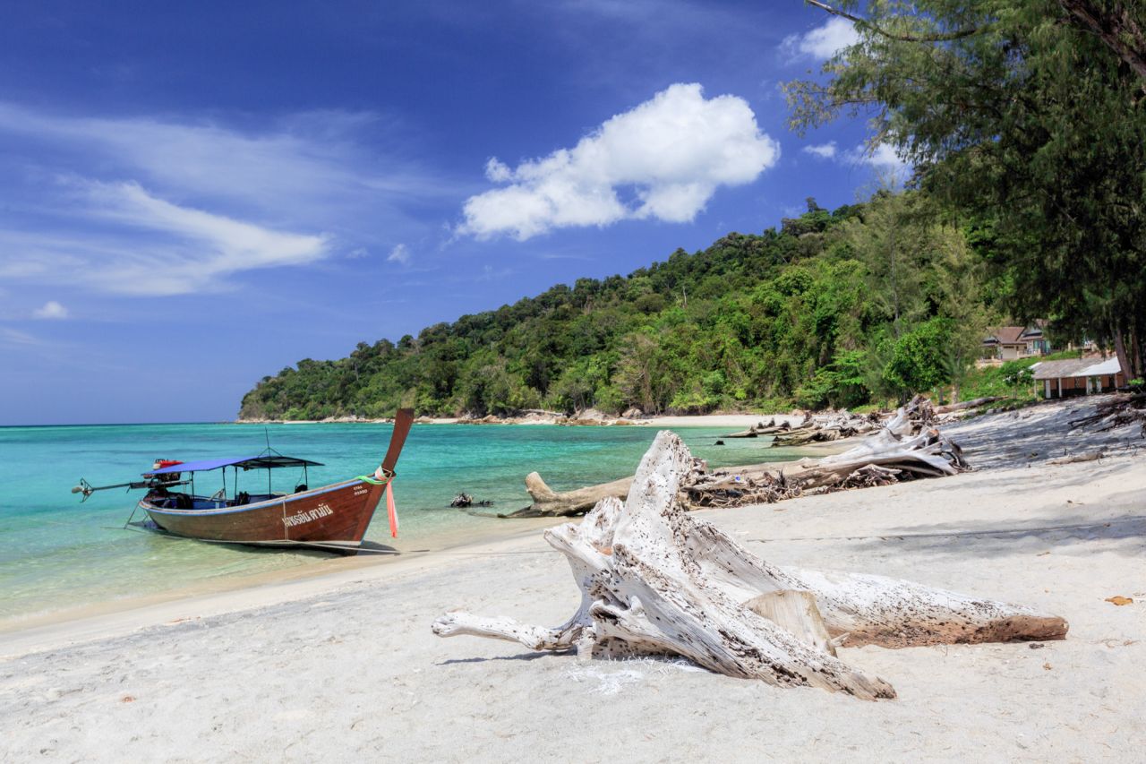 Ko Adang's beaches are reached by long-tail boat.