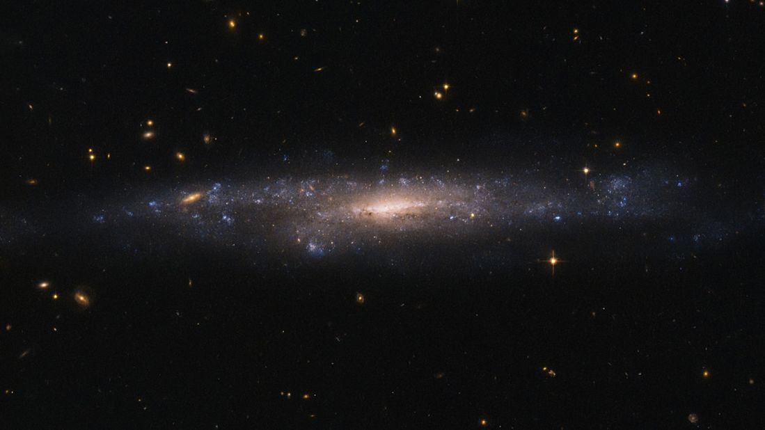 The Hubble Space Telescope captured an image of a hidden galaxy that is fainter than Andromeda or the Milky Way. This low surface brightness galaxy, called UGC 477, is over 110 million light-years away in the constellation of Pisces.
