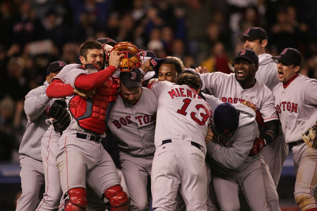 Red Sox players celebrate their win over the New York Yankees in game seven in 2004.
