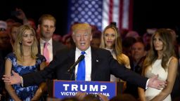 Republican presidential candidate Donald Trump is joined by his wife Melania, right, daughter Ivanka, left, and son Eric, background left, as he speaks during a primary night news conference, Tuesday, May 3, 2016, in New York. (AP Photo/Mary Altaffer)