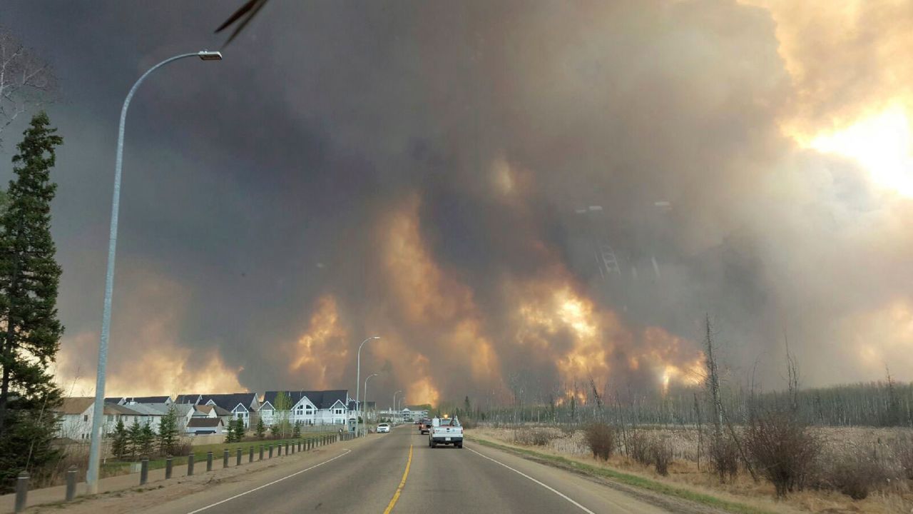  The entire population of Fort McMurray has been ordered to evacuate as a wildfire engulfed homes. 