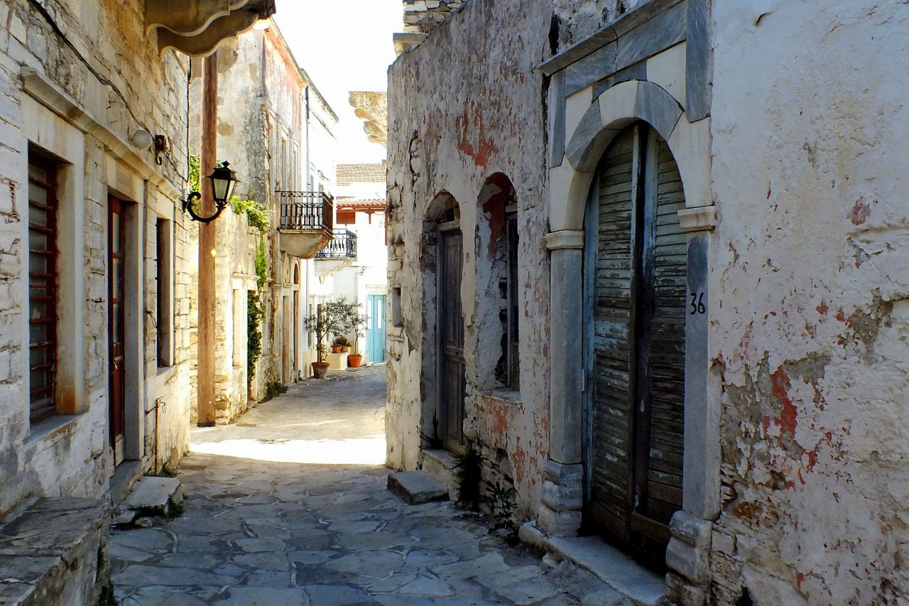 Narrow streets in villages like Chalki hold their own clues to island life. 