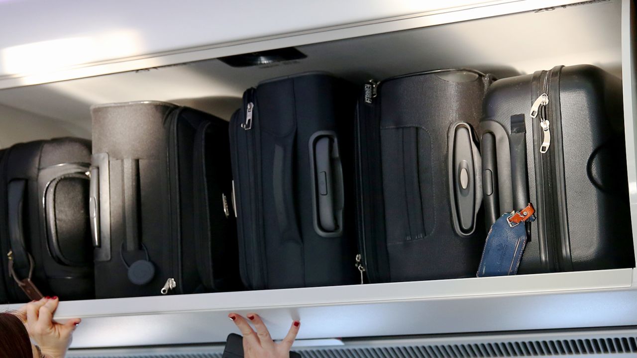 Overhead luggage: Keep calm and carry on. 