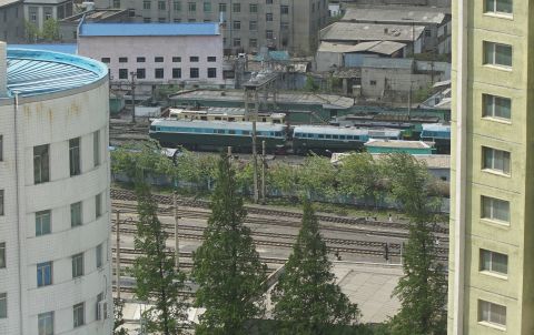 A train can be seen from the window of the Koryo Hotel in Pyongyang.