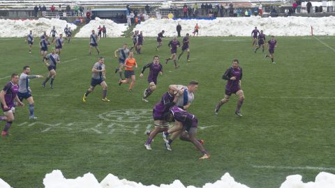 Denver and Ohio braved the weather during their opening weekend clash.