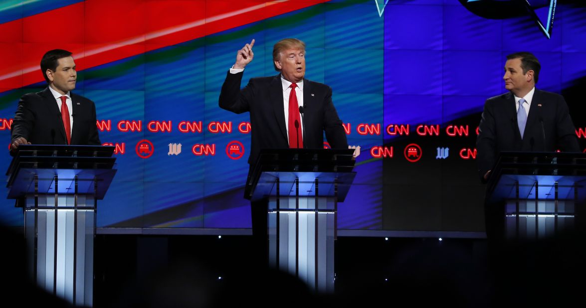 Trump — flanked by US Sens. Marco Rubio, left, and Ted Cruz — speaks during a CNN debate in March 2016. Trump dominated the GOP primaries and emerged as the presumptive nominee in May of that year.