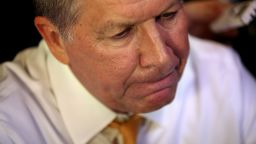 Former Republican presidential candidate John Kasich talks with reporters after having lunch at PJ Bernstein's Deli Restaurant on April 16, 2016 in New York City.