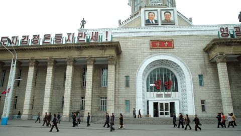 Portraits of former leaders Kim Il Sung and Kim Jong Il look down from the clock tower of Pyongyang Central Railway Station. The station is a major hub for travelers to and from the capital, including many of the delegates for the upcoming Workers' Party Congress, which starts on May 6.