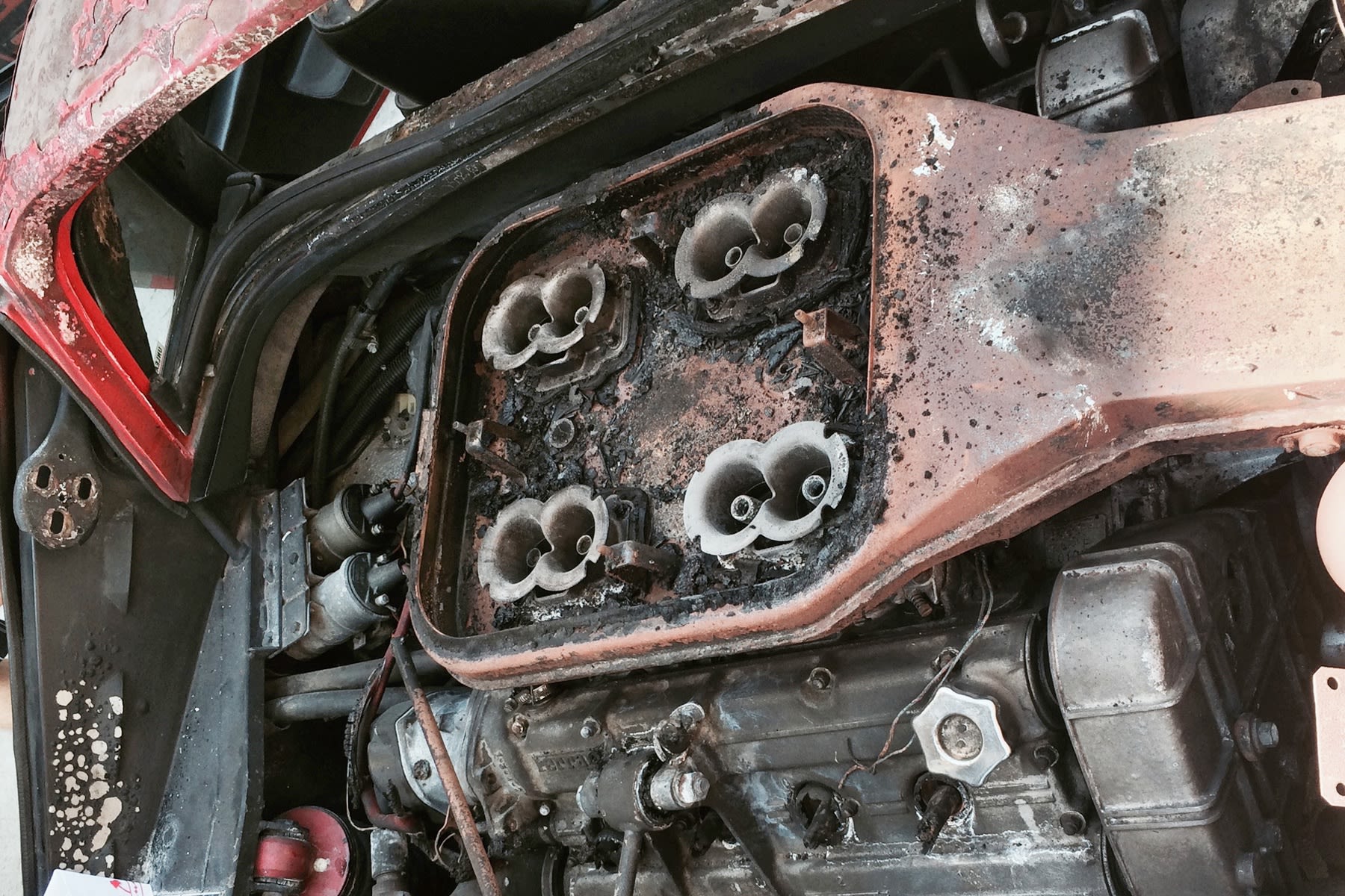 Hutchison and his friend and electric car restorer Michael Bream set about replacing the burned-out remains V8 engine and its four Weber carburetors with a electric motor.