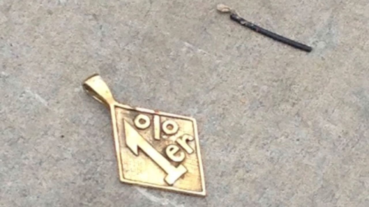 Jewelry lies on the asphalt in the Twin Peaks parking lot. The label is derived from a quote that may be apocryphal but is part of biker lore that dates to the 1960s: Someone supposedly said that 99% of bikers are law-abiding citizens, leaving the mayhem to the other 1%.