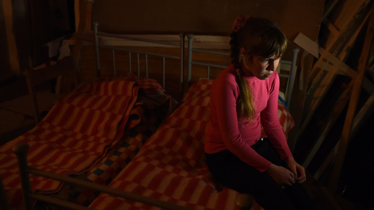 Liana, 11, the daughter of the school janitor at school #2 in Myronivskyi, near to the front line in eastern Ukraine.