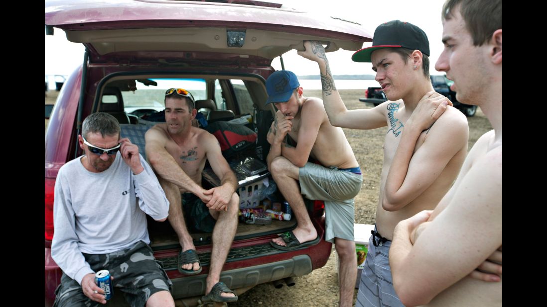 People camp out at a beach south of Fort McMurray on May 4.