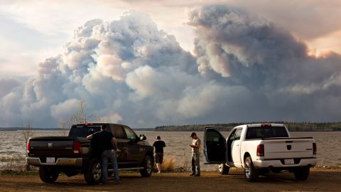 Evacuees watch the wildfire near Fort McMurray on May 4.